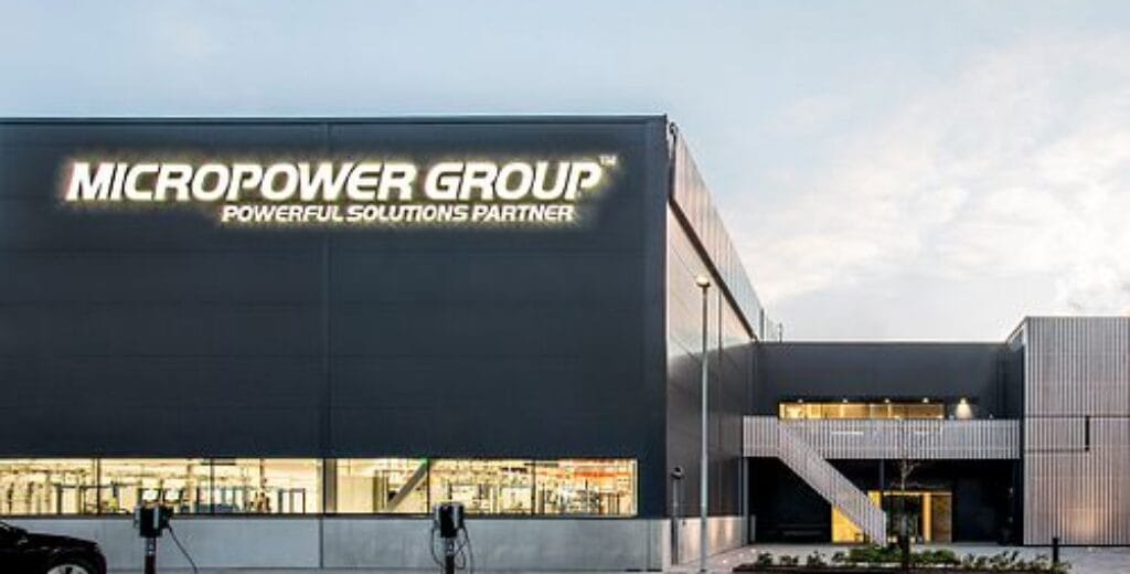 Micropower Groups anläggning med logotyp tydlig på fasaden.